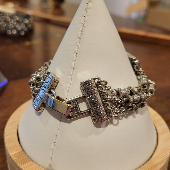 Brighton Silver Tone Multi Chain Bracelet with cross and floral design - Picture 4 of 7